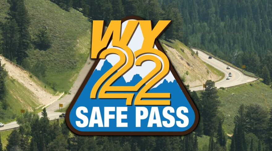 An image of the highway over Teton Pass, with a logo superimposed over it that reads, "WY 22 Safe Pass."