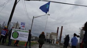 Yvonne Taylor and other protestors gather outside the Greenidge Generation Facility in Torrey, NY in April before the facility's Bitcoin mining expansion was approved. (Vaughn Golden/WSKG)