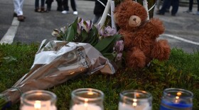 A memorial for Eric Logan is set up along William Street outside the Central High Apartments where Logan was shot and killed by Sergeant Ryan O'Neill on Sunday Morning.