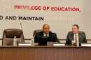Mo Green (left) speaks at this week's state Board of Education meeting.