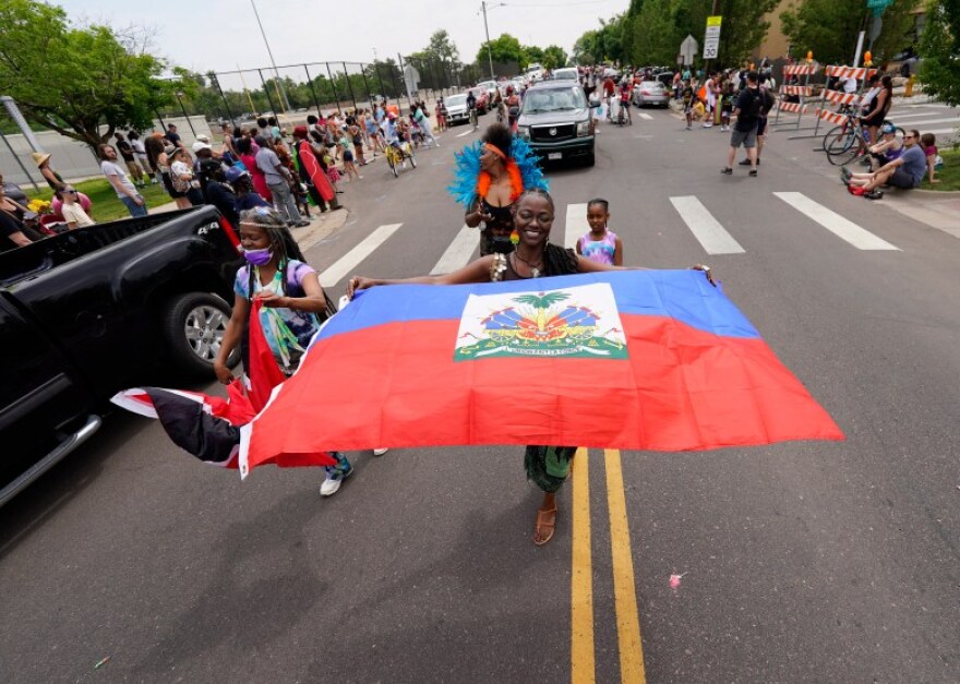 Members of the Caribbean Student Coalition march during a parade to mark Juneteenth on Saturday, June 19, 2021, in Denver. Several events were being staged around the Mile High City as well as nationwide to commemorate June 19, 1865, when African-Americans in Texas learned of their freedom, two years after the Emancipation Proclamation.