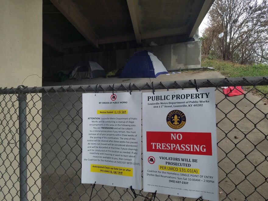 City warning posted outside a homeless encampment at Oak and Floyd streets in Old Louisville