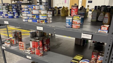 The shelves at Lake Cares Food Pantry are only partially stocked.