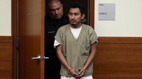 Gerson Fuentes, right, the man accused of raping and impregnating a 9-year-old Ohio girl, who at 10 had to travel to Indiana for an abortion, enters Franklin County common pleas court in Columbus, Ohio, for his bond hearing, July 28, 2022. On Wednesday, July 5, 2023, Fuentes pleaded guilty to two counts of rape. He was sentenced to life in prison but, as part of his plea deal, will be eligible to seek probation after serving 25 to 30 years. He will also have to register as a sex offender.