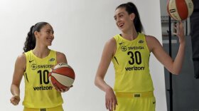 WNBA players Sue Bird and Breanna Stewart pose during a photo session during the Seattle Storm's media day.