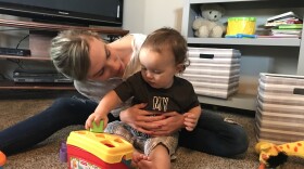Courtney Reimlinger plays with her 16-month-old son, Kallum. The 23-year-old Indianapolis woman was hospitalized with postpartum eclampsia a week after Kallum was born.