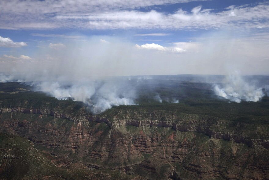 The Dragon Bravo Fire continues to burn on the Grand Canyon's north rim Saturday, July 19, 2025. (Joe Rondone/The Arizona Republic via AP, Pool)