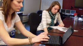 CU Journalism students Kate Spencer (left) and Isa Jones (right) work at the school's online news site, the CU Independent.