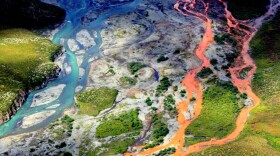 An aerial view of the rust-colored Kutuk River in Gates of the Arctic National Park in Alaska.