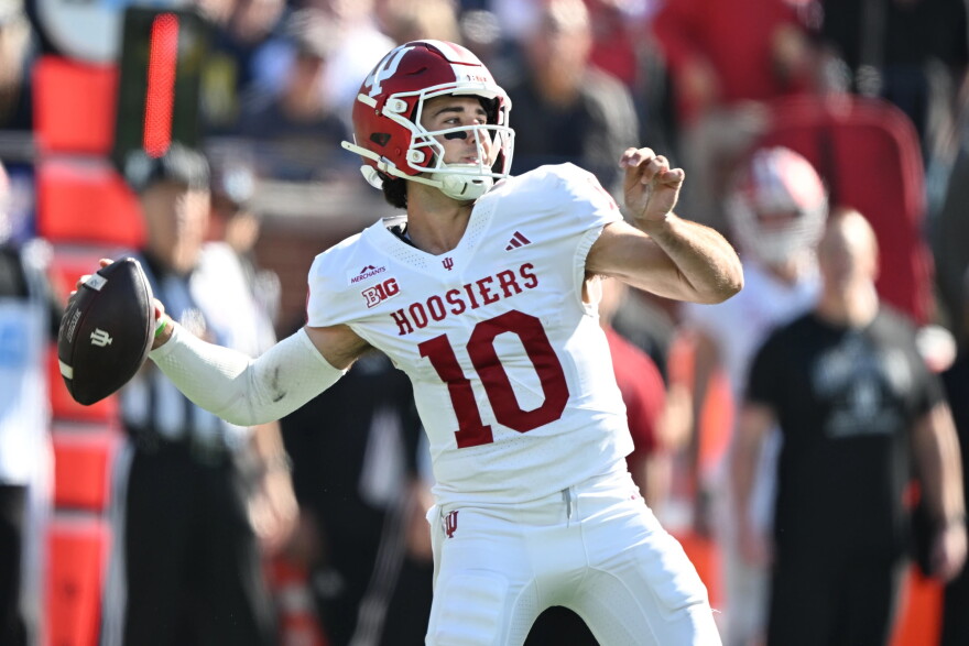Indiana quarterback Josh Hoover throws a pass in the first quarter of an NCAA college football game against Michigan, Saturday, Oct. 24, 2026, in Ann Arbor, Mich.
