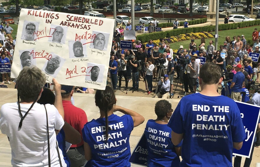 Protesters gather outside the state Capitol building on Friday, April 14, 2017, in Little Rock, Ark., to voice their opposition to Arkansas' seven upcoming executions. (Kelly P. Kissel/AP)