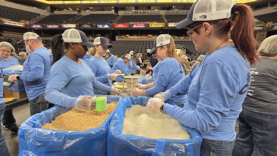 Volunteers at Gainbridge Fieldhouse assemble soy and rice casserole meals, for distribution to Gleaners Food Bank and Midwest Food Pantry, on Feb. 10, 2026.