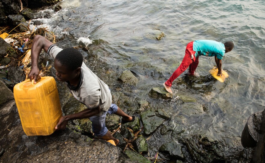 Some folks in Goma get water for personal needs. Others make a living by filling up jerrycans and selling the water in city neighborhoods.