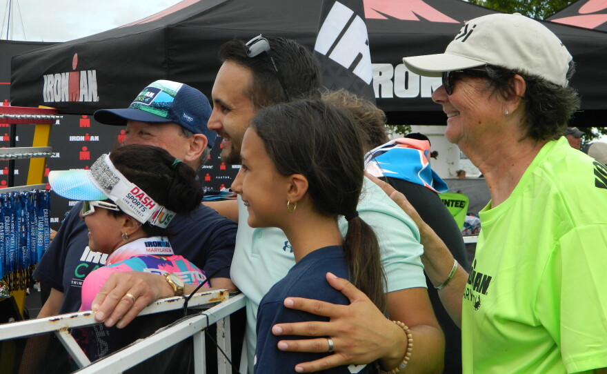 Suver poses with her loved ones at the finish line.