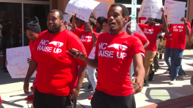 Earl Bradley (Left) has been on the front lines fighting for a boost in minimum wage. 