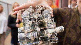 Easterseals staff show the latest gift from anonymous donor "Pete," Nov. 20, 2025