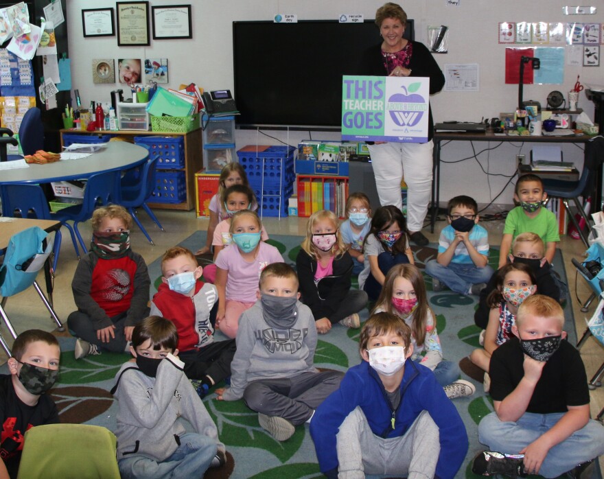 Angie Stewart with her classroom of students.