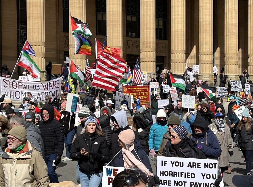 The No Kings Rally marches past the front steps of Buffalo's City Hall on Saturday, March 28, 2026.