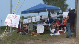 Several local residents sit along Wildlife In Nature’s property to support Tim Stark and his animals.