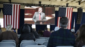 Guests of Rep. Doug LaMalfa's memorial watch a slideshow before the service while seated in an overflow area on Jan. 24, 2026, at Silver Dollar Fairgrounds in Chico, California.