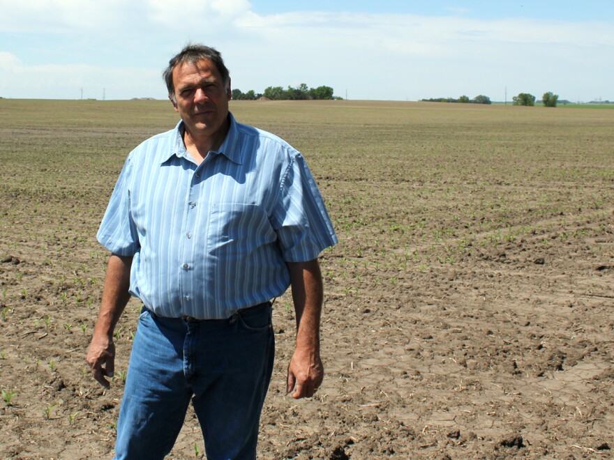 Farmer Tim Mueller raises corn and soybeans in Nebraska. He is hoping to get into the chicken business by signing a contract to raise birds for a subsidiary of Costco.