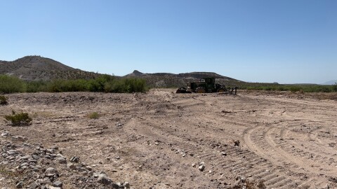 An image shared by the Texas General Land Office showing Barnard Construction working on what the agency called “illegal” land clearing activity related to the Big Bend area border wall plan.