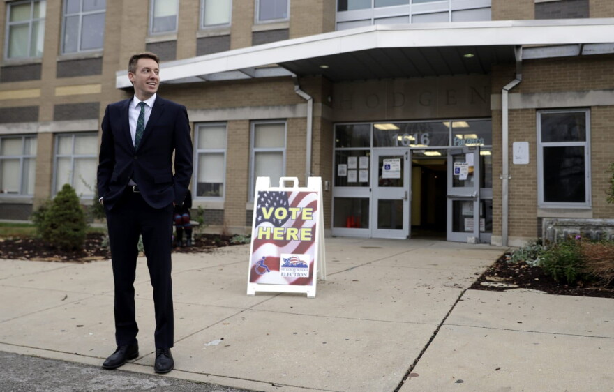 Jason Kander stands outside a polling place on, Nov. 8, 2016, in St. Louis, during his U.S. Senate campaign. (Jeff Roberson/AP)