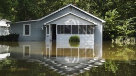 A flooded home is seen in Indianapolis, Sunday, Aug. 16, 2026.