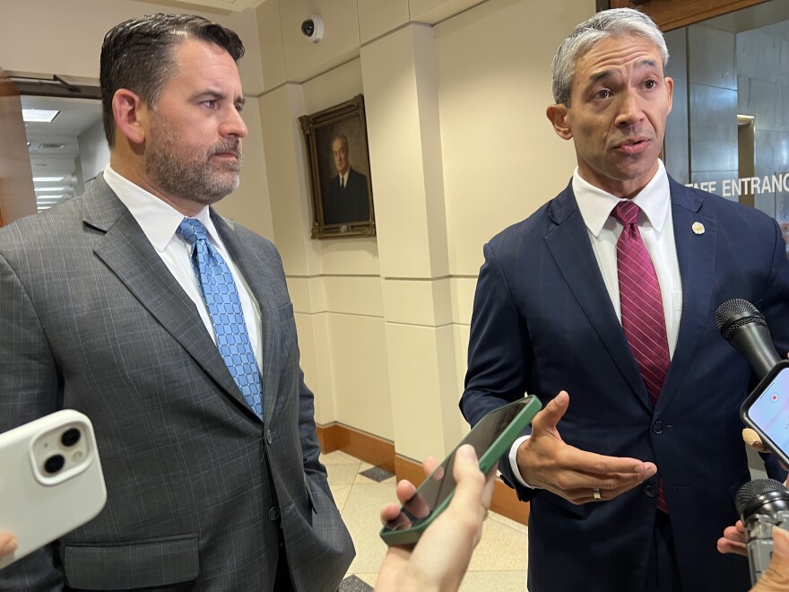 San Antonio City Manager Erik Walsh and Mayor Ron Nirenberg speak to members of the press corps after Thursday's city council vote on the 2023 budget.