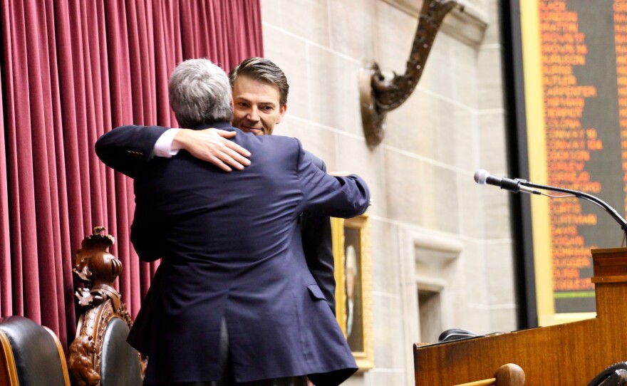 House Speaker Todd Richardson hugs his father, former House Minority Leader Mark Richardson. Mark Richardson almost became speaker in the 1990s after a Democratic revolt.