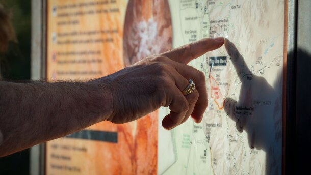 Visitors read a sign at southern Utah’s Bryce Canyon National Park, May 31, 2024.