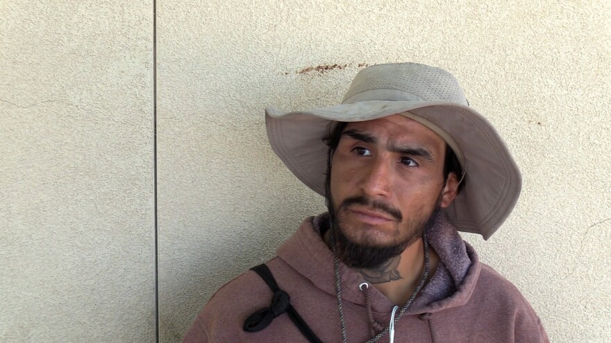 Nathaniel Ramirez stands outside of the Casa de Peregrinos food pantry and speaks about his own experiences with food insecurity.
