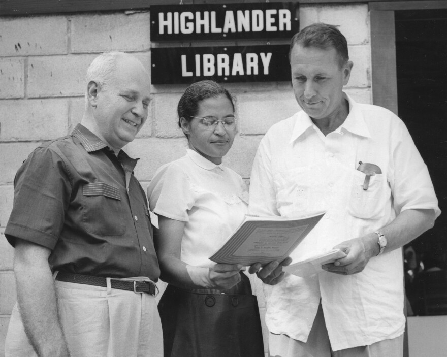 FILE - In this undated photo provided by the Nashville Banner Archives, Nashville Public Library, Special Collections, Rosa Parks, center, and Myles Horton, right, meet at the Highlander Library in Monteagle, Tenn. (Nashville Banner Archives, Nashville Public Library, Special Collections via AP)