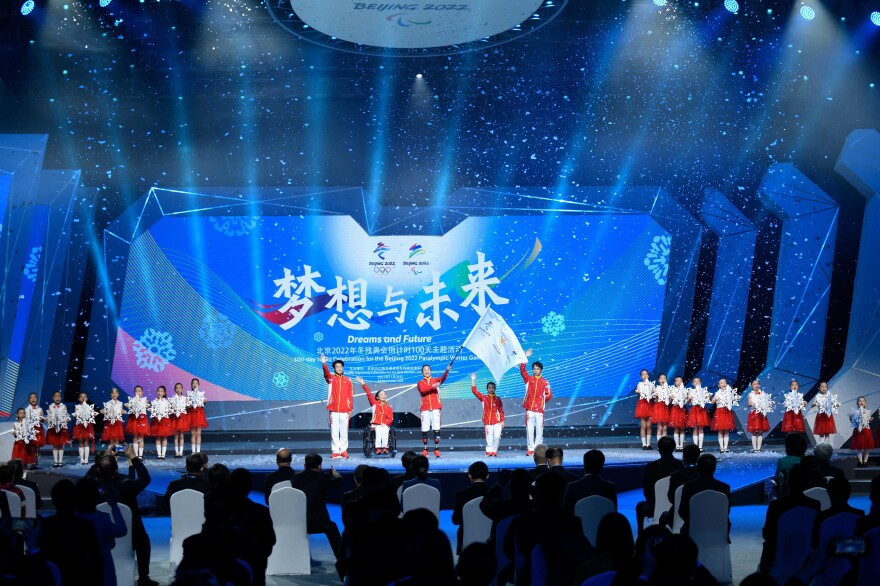 People attend the Beijing 2022 Paralympic Winter Games 100 Day countdown event at the National Aquatic Center in Beijing, China, on Nov. 24, 2021. [Wang Zhao / AFP via Getty Images]
