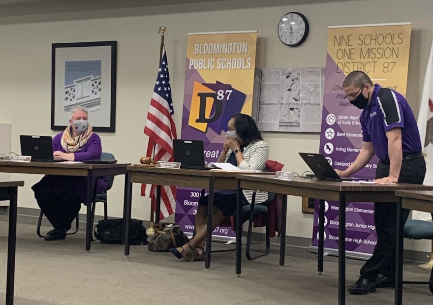 From left, District 87 board members Elizabeth Fox Anvick and Brigette Gibson and District 87  Superintendent Barry Reilly prepare for the school board meeting Wednesday, April 28, 2021.