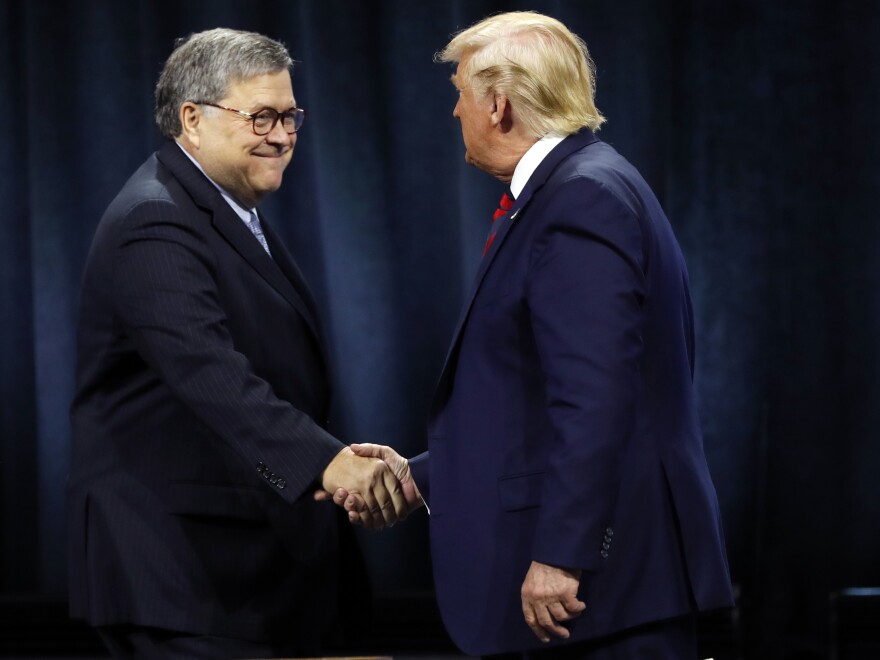 President Donald Trump greeted Attorney General William Barr before Trump signed an executive order creating a commission to study law enforcement and justice on Oct. 28, 2019.