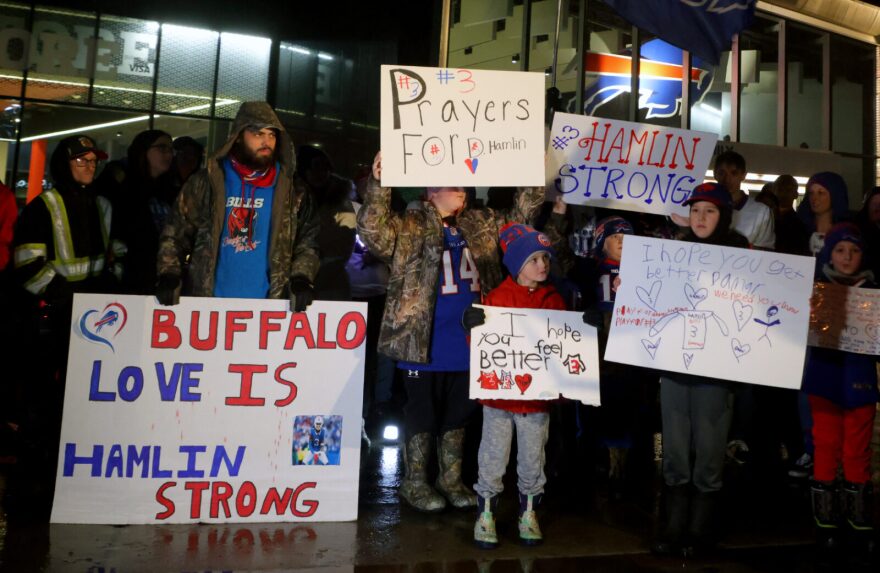 Buffalo Bills fans attend a candlelight prayer vigil for player Damar Hamlin.