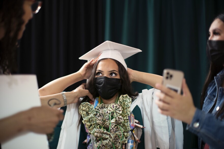 Cailyn Benson's personal graduation took place in Reynolds High School's multi-purpose room. Benson was sad she couldn't be with her friends, and she mourned the big, traditional ceremony they missed out on. "I guess I just need to enjoy what I've got," she said.