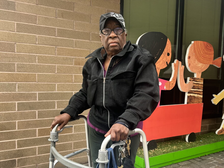 Margaret Gordon, founder of the West Oakland Environmental Indicators Project, stands outside the West Oakland Public Library in her neighborhood, where she says soot from industrial activity and truck traffic collects on indoor surfaces.