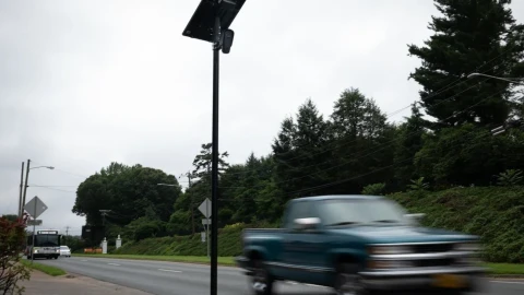 A car drives past an automatic license plate reader on Route 29 in Charlottesville on June 27, 2025.