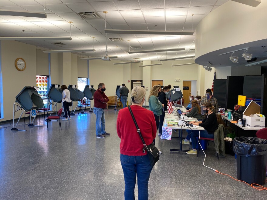 Voters cast their ballots at the Peoria Heights Public Library on Tuesday, Nov. 3, 2020.