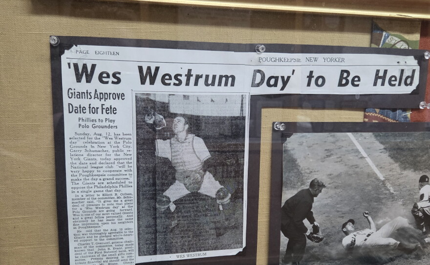 A display shows newspaper clippings of Wes Westrum, a Clearbrook native who played Major League Baseball in the 1950s. The display is in Clearbrook City Hall.