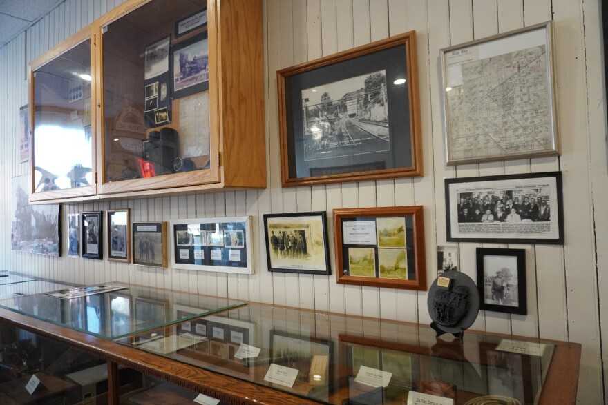 There are many donated items at the Coalport Area Coal Museum, including coal mining tools, historical photos, maps and news clippings. 