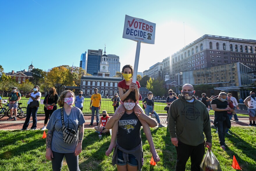 A view of voting rights signs as people gather during a Count Every Vote Rally in Philadelphia in front of Independence Hall.