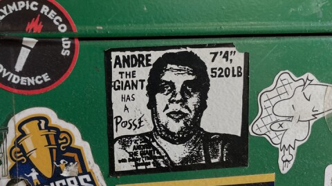 An original "Andre the Giant Has a Posse" sticker on a trash can in Providence's Nice Slice pizzeria.