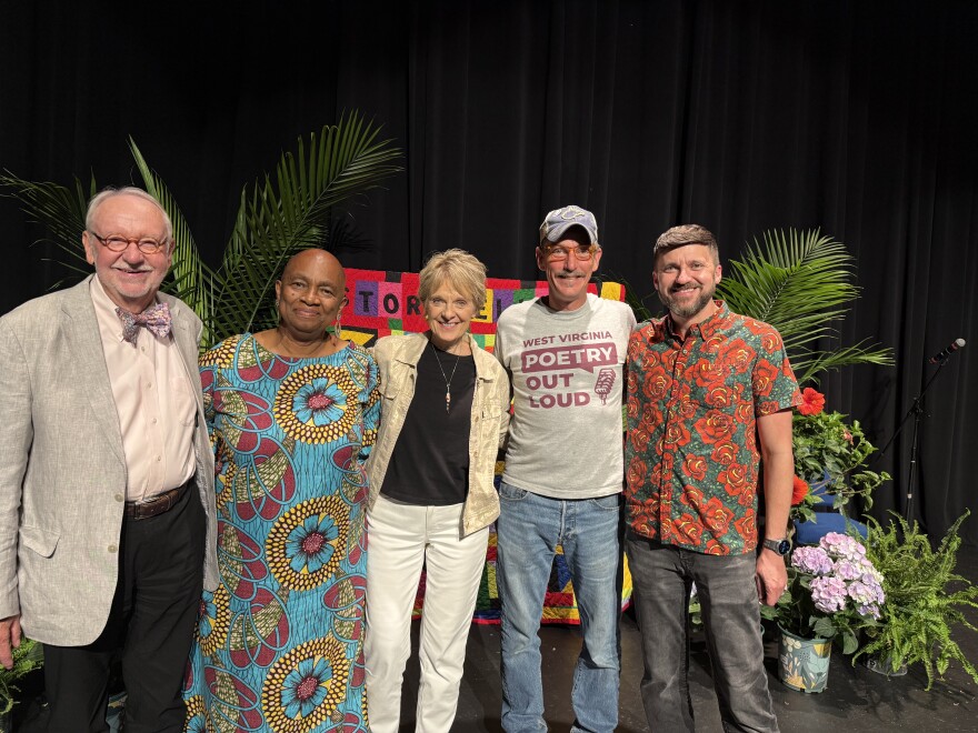From left to right: Donald Davis, Jackie Mickel, Dolores Hydock, Bil Lepp and Josh Goforth pose with the "Storytelling Quilt" made from the quilters of Gee's Bend / 2025