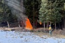 A fire fighter watching a prescribed burn in Millcreek Canyon in October 2025
