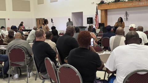 Sen. April Baskin speaks at the inaugural Breaking Bread dinner on Aug. 27.