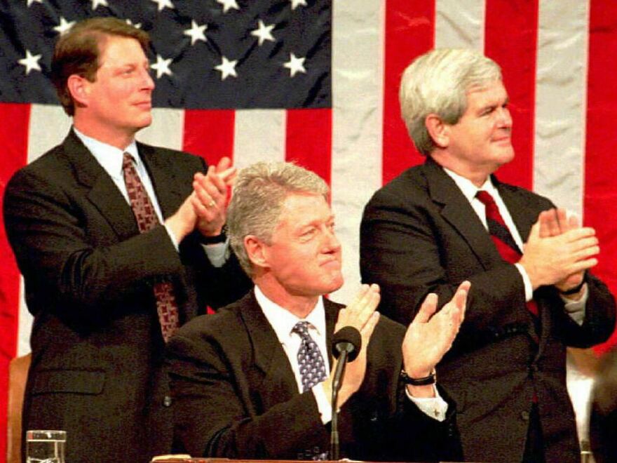 President Bill Clinton along with Vice President Al Gore and Speaker Newt Gingrich applaud World War II veteran Jack Lucas during the 1995 State of the Union address.