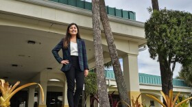  Dr. Kristen Dimas stands in front of the Healthcare Network building in Immokalee, FL. 